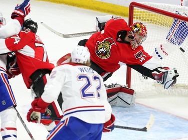 Craig Anderson of the Ottawa Senators can't make the save on the game tying goal by Dale Weise of the Montreal Canadiens during third period action at Canadian Tire Centre in Ottawa, April 19, 2015.