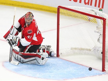 Craig Anderson of the Ottawa Senators makes the save during first period action.
