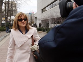 Crown witness Nicole Proulx outside the Elgin St. courthouse after a long day of testimony, Friday, April 24, 2015. Day 14 and the third week of Mike Duffy's trial ended with defence lawyer Donald Bayne sparring with the witness and lawyers spaaring with each other. Proulx will be back on the stand next week. Mike Carroccetto / Ottawa Citizen