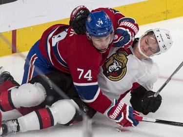 Ottawa Senators' Curtis Lazar is dumped by Montreal Canadiens' Alexei Emelin during first period of Game 2.