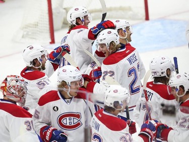 Dale Weise (22) of the Montreal Canadiens celebrates his game winning goal against the Ottawa Senators at Canadian Tire Centre in Ottawa, April 19, 2015.
