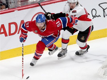 David Desharnais is chased by Jean-Gabriel Pageau in the first period as the Ottawa Senators take on the Montreal Canadiens at the Bell Centre in Montreal for Game 5 of the NHL Conference playoffs on Friday evening.