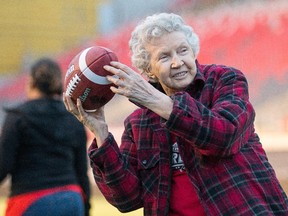 Doris Zastre, 85, throws the ball as the Ottawa Redblacks coaching staff and players invited women to join them at TD Place for a night of football strategy and fun. Participants took part in learning sessions with coaches and players on the TD Place field and in the actual meeting rooms used by the Redblacks.