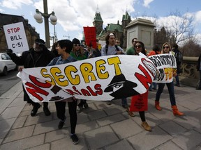 Protestors gathered in front of the prime minister's office in Ottawa to demonstrate against Bill C-51.