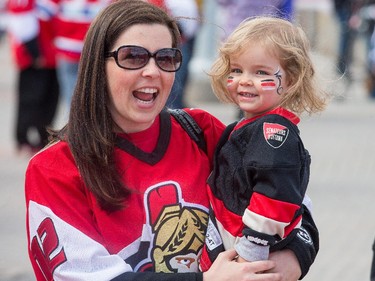 Emma Munhall, 2, her mom Tracy in the Fan Zone as the Ottawa Senators take on the Montreal Canadiens at the Canadian Tire Centre in Ottawa for Game 6 of the NHL Eastern Conference playoffs on Sunday evening.