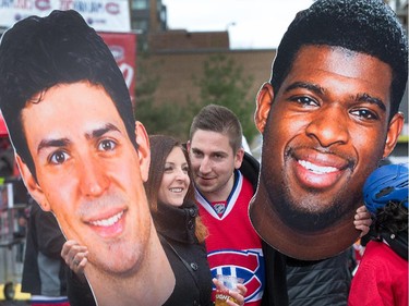 Eric Briand with his wife Elizabeth Hayden brought giant cutouts of Carey Price and P.K. Subban to Fan Jam 2015 as the Ottawa Senators get set to take on the Montreal Canadiens at the Bell Centre in Montreal for Game 5 of the NHL Conference playoffs on Friday evening.