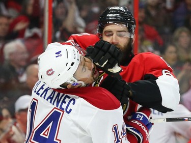 Eric Gryba of the Ottawa Senators hits Tomas Plekanec of the Montreal Canadiens during first period of Game 6.