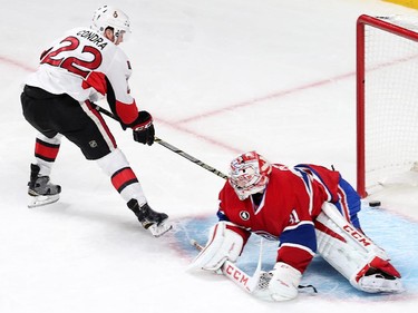 Erik Condra scores on Carey Price in the third period as the Ottawa Senators take on the Montreal Canadiens at the Bell Centre in Montreal for Game 5 of the NHL Conference playoffs on Friday evening.