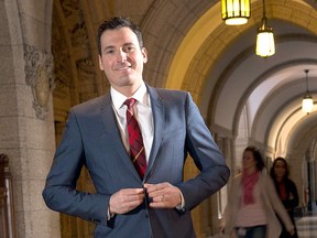 CBC TV and radio host Evan Solomon wears a slate blue suit in Centre Block on Parliament Hill. Just don’t ask him who designed it.