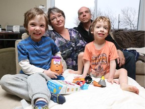 Lucas, 3, (right) is shown here with his family.