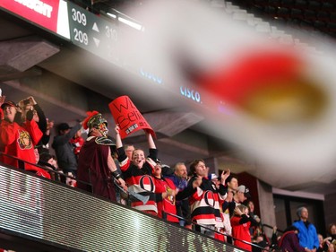 Fans celebrate the Senators first goal against the Montreal Canadiens at Canadian Tire Centre, April 24, 2015.