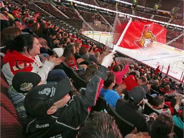 Fans enjoy the playoff action opposing the Ottawa Senators and the Montreal Canadiens at Canadian Tire Centre, April 24, 2015.