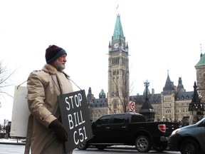 Frances Scholten from Hammond, Ont., said he is against Bill C-51 because it threatens his right to protest. Over 300 people gathered by the PM's office in Ottawa in opposition of Bill C-51 on Saturday March 14, 2015 as part of a nation wide protest.