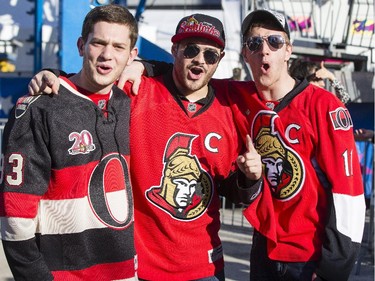 From left, Adam Sherman, Eliason Aboukassam and Cameron Ormrod show off their Sens spirit during FanJam 2015 prior to the start of game one between the Montreal Canadiens and Ottawa Senators in Montreal Wednesday April 15, 2015.