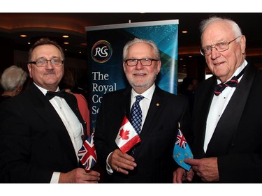 From left, Gregory Evanik, president of the Ottawa branch of the Royal Commonwealth Society, with former long-serving deputy minister Peter Harder and Peter Meincke, co-chair of the 27th Commonwealth Dinner held at Brookstreet Hotel on Tuesday, April 7, 2015.