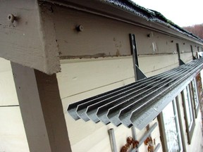 This louvred eavestrough alternative breaks roof run-off into droplets and directs them out and away from the building.