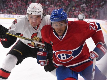 Devante Smith-Pelly of the Montreal Canadiens and Cody Ceci of Ottawa Senators battle for position in Game Two.
