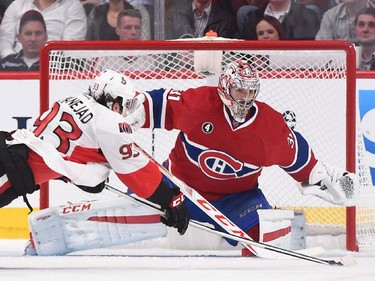 Carey Price #31of the Montreal Canadiens protect the net against Mika Zibanejad #93 of Ottawa Senators in Game Two of the Eastern Conference Quarterfinals during the 2015 NHL Stanley Cup Playoffs at the Bell Centre on April 17, 2015 in Montreal, Quebec, Canada.