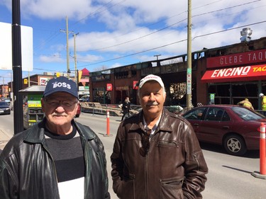 Owners Sam Bellama, left, and George Helal vow they'll rebuild low-rise complex that was destroyed at Bank and Fifth.