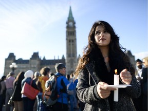 Grishma Dahal, member of Ottawa Nepalese community, attends the candlelight vigil.