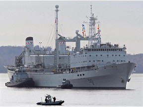 HMCS Preserver is pushed by tugs in Halifax harbour on Oct. 19, 2011. The Canadian navy is going to retire four veteran ships that have been in service for decades. THE CANADIAN PRESS/Andrew Vaughan