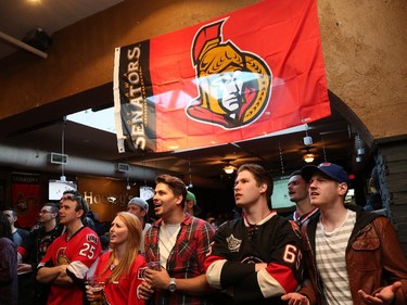 Hockey fans in Hooley's Pub on the Sensmile on Elgin Street to watch the Ottawa Senators take on the Montreal Canadiens on television in game 1 of the playoffs.