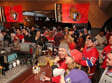 Hockey fans in Hooley's Pub on the Sensmile on Elgin Street to watch the Ottawa Senators take on the Montreal Canadiens on television in game 1 of the playoffs.