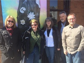 The Used Clothing Drive 'team photo' outside of Glashan Public School includes, from left, Kathi Elborn, parent volunteer; Angela Keller-Herzog, chair of Glashan Green Team; Karen Hawley, Ecology Ottawa volunteer; principal Jim Tayler; and Scott Nowlan, parent volunteer.