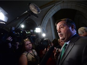 Defence Minister Jason Kenney speaks to reporters as he enters the House of Commons for question period on Parliament Hill in Ottawa on Wednesday, April 1, 2015.