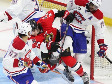 Jean-Gabriel Pageau of the Ottawa Senators battles against P.K. Subban of the Montreal Canadiens during second period action.