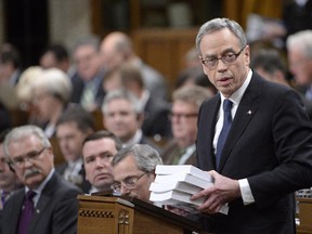 Minister of Finance Joe Oliver deliver tables the federal budget in the House of Common on Parliament Hill in Ottawa on Tuesday, April 21, 2015.