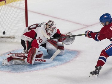 Montreal Canadiens' Lars Eller scores a short-handed goal past Ottawa Senators goalie Andrew Hammond during scond period of Game 1 NHL Stanley Cup first round playoff hockey action Wednesday, April 15, 2015 in Montreal.