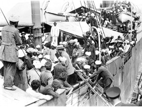 Leonard Frank photo, Vancouver Public Library VPL 6232. Crowded deck of the Komagata Maru in Vancouver harbour in 1914.