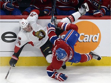 Ottawa Senators defenseman Mark Borowiecki (74) checks Montreal Canadiens right wing Brendan Gallagher (11) during first period of Game 2 NHL first round playoff hockey action Friday, April 17, 2015 in Montreal.