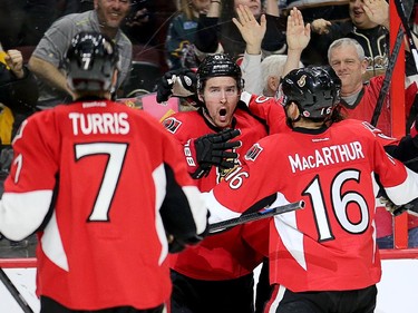 Mark Stone (C) celebrates his goal in the third period as the Ottawa Senators take on the Pittsburgh Penguins in NHL action at Canadian Tire Centre in Ottawa. Assignment - 118582 Photo taken at 20:33 on April 7. (Wayne Cuddington / Ottawa Citizen)
