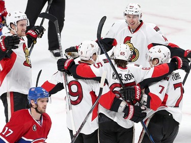 Mark Stone joins Milan Michalek, Patrick Wiecioch, Kyle Turris and Erik Karlsson to celebrate the third Senator goal in the second period as the Ottawa Senators take on the Montreal Canadiens at the Bell Centre in Montreal for Game 5 of the NHL Conference playoffs on Friday evening. Assignment - 120437 Photo taken at 20:36 on April 24. (Wayne Cuddington / Ottawa Citizen)