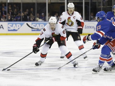 Ottawa Senators right wing Mark Stone (61) skates against New York Rangers defenseman Keith Yandle (93) during the third period.