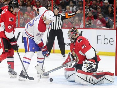 Mark Stone moves in to help Craig Anderson as they battle Dale Weiss in front of the net in the second period as the Ottawa Senators take on the Montreal Canadiens at the Canadian Tire Centre in Ottawa for Game 6 of the NHL Eastern Conference playoffs on Sunday evening.