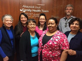 Members of the Akausivik Inuit Family Health Team, left to right: Mary Hutton, RN, Connie Sideule, executive director, Aigah Attagutsiak, case manager/ interpreter, Emily Aqpik, medical secretary, Santos Lopez, medical secretary, Jason Creaghan, physician, Indu Gambhir, physician.