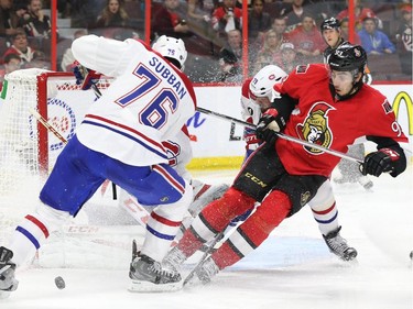 Mika Zibanejad of the Ottawa Senators battles against P.K. Subban of the Montreal Canadiens during second period of NHL action at Canadian Tire Centre in Ottawa, April 26, 2015.