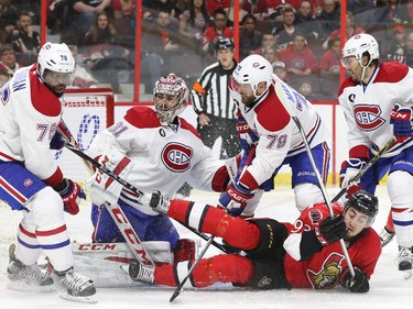 Mika Zibanejad of the Ottawa Senators battles against P.K. Subban, Carey Price, Andrei Markov and Pierre-Alexandre Parenteau of the Montreal Canadiens during second period of NHL action at Canadian Tire Centre in Ottawa, April 26, 2015.