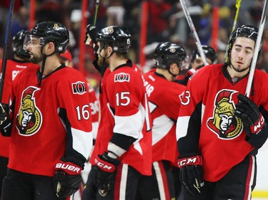 Mika Zibanejad (R) and the Ottawa Senators show their dejection after losing their series against the Montreal Canadiens during third period of NHL action at Canadian Tire Centre in Ottawa, April 26, 2015.  (Jean Levac/ Ottawa Citizen)