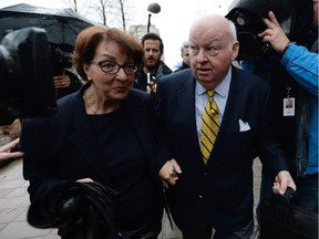 Heather Duffy, left, arrives at court earlier this week with suspended Sen. Mike Duffy.