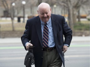 Suspended Senator Mike Duffy arrives at the courthouse for his trial in Ottawa, Friday, April 17, 2015.