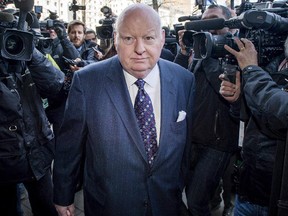 Suspended senator Mike Duffy arrives for his first court appearance at the courthouse in Ottawa on Tuesday, April 7, 2015. The Senate expense scandal lands squarely back under the spotlight today as the long-awaited trial of suspended Conservative senator Mike Duffy gets underway in an Ottawa courtroom. The trial, currently scheduled to last more than 40 days, will give Duffy a chance to clear his name as he faces allegations of bribery, fraud and breach of trust.