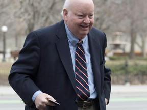 Suspended Senator Mike Duffy arrives at the courthouse for his trial in Ottawa, Friday, April 17, 2015.
