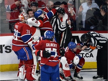 Montreal Canadiens and Ottawa Senators players scuffle after the Canadiens 4-3 win in Game 1 of the NHL first round playoff series Wednesday, April 15, 2015 in Montreal.THE CANADIAN PRESS/Ryan Remiorz
