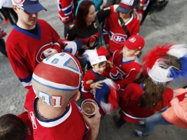 Montreal Canadiens fans party in the fan zone before game two against the Ottawa Senators at the Bell Centre in Montreal Friday April 17, 2015. (Darren Brown/Ottawa Citizen)