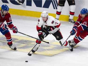 Montreal Canadiens' Lars Eller, left, and Jacod De La Rose, right, chases Ottawa Senators' Kyle Turris during the first period of NHL playoff action at the Bell Centre in Montreal Wednesday April 15, 2015.