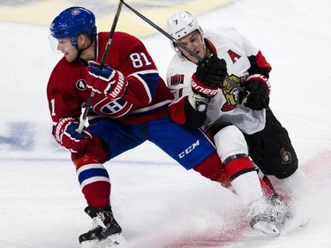 Montreal Canadiens' Lars Eller, left, Ottawa Senators' Kyle Turris battle for the puck during the first period of NHL playoff action at the Bell Centre in Montreal Wednesday April 15, 2015.